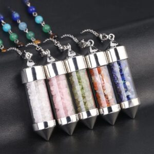 Five gemstone pendants, silver metal, with different colored small stones inside glass tubes.