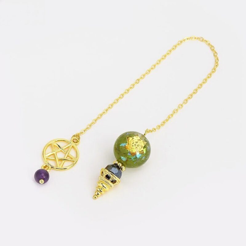 Gold-toned pendulum with green glass bead, star charm, and amethyst bead.  Spiritual, decorative.