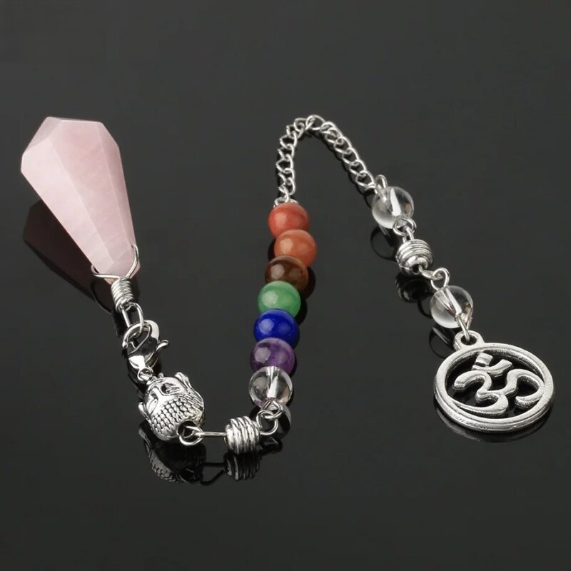 Pink rose quartz pendulum with chakra beads and om symbol.