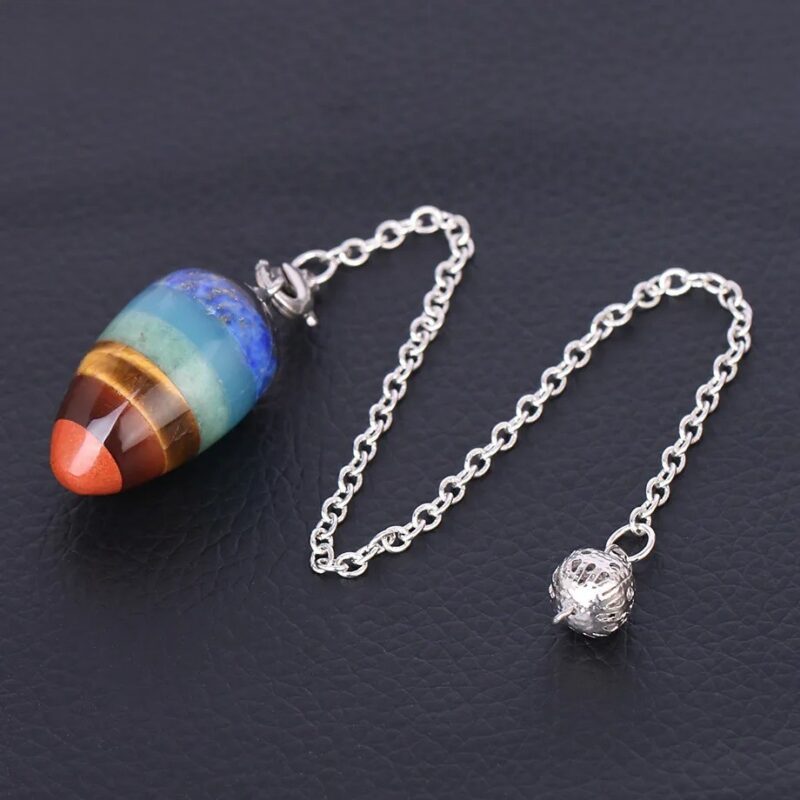Multi-colored chakra pendulum with metal chain and ball.  Spiritual, healing.