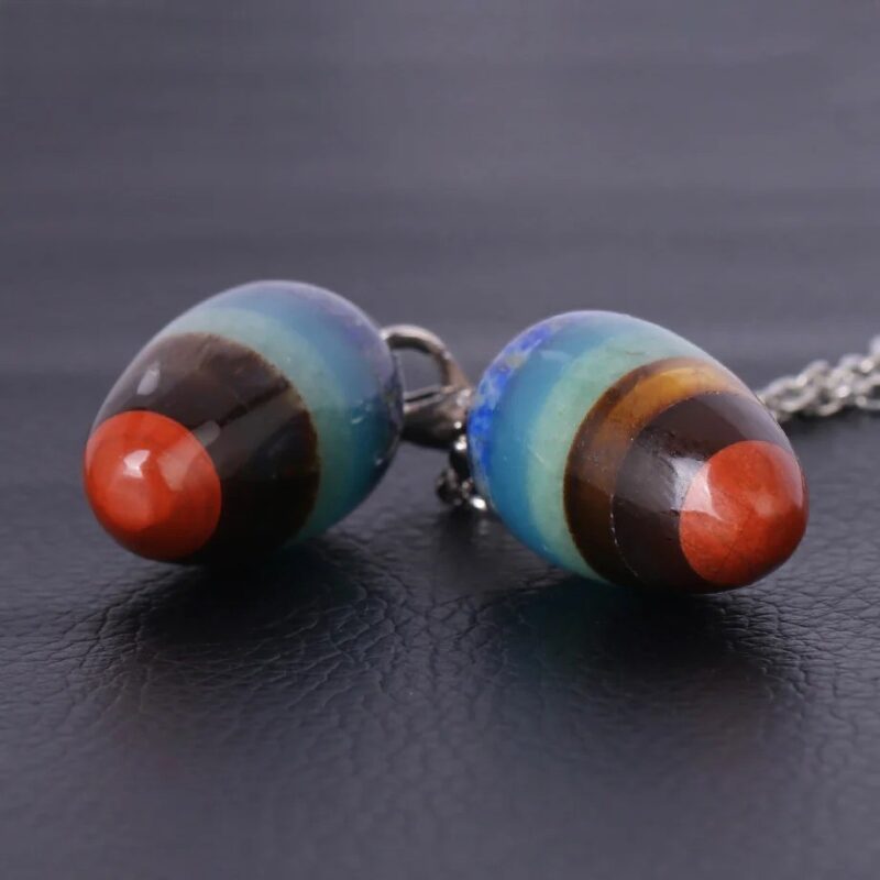 Multicolored eye-shaped pendant necklace charms.