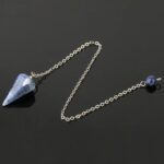 Blue stone pendulum with silver chain.