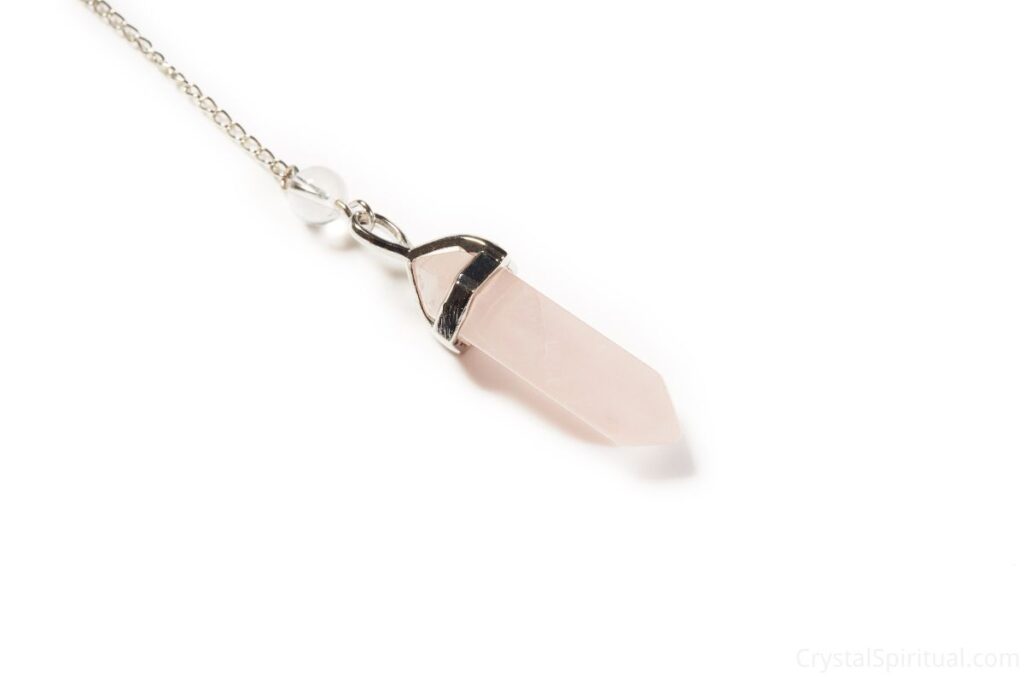 Pink rose quartz pendulum, silver chain and clear quartz.