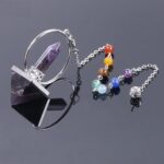 Purple amethyst pyramid pendulum with chakra beads.