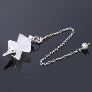 Clear quartz pendulum with silver chain and metal ball.  Crystal divination tool.
