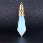 Light blue-white, faceted pendant with gold-tone cap.