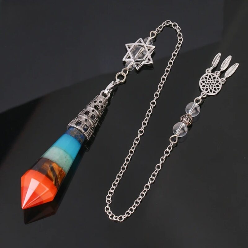 Multi-colored gemstone pendulum with metal chain and charm.