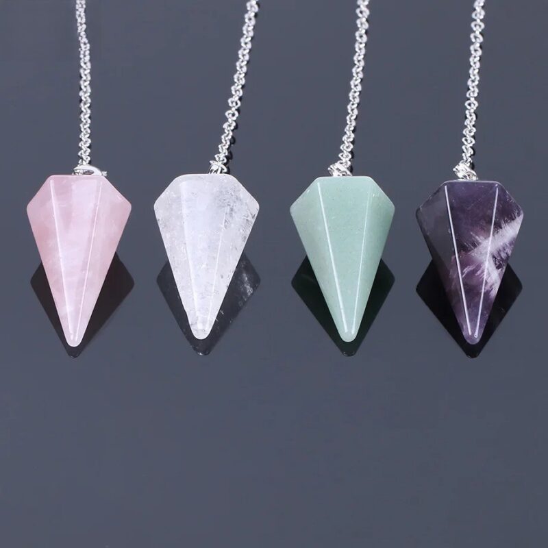 Four gemstone pendulums: rose quartz, clear quartz, green aventurine, amethyst.