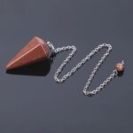 Brown sunstone pendulum with silver chain.
