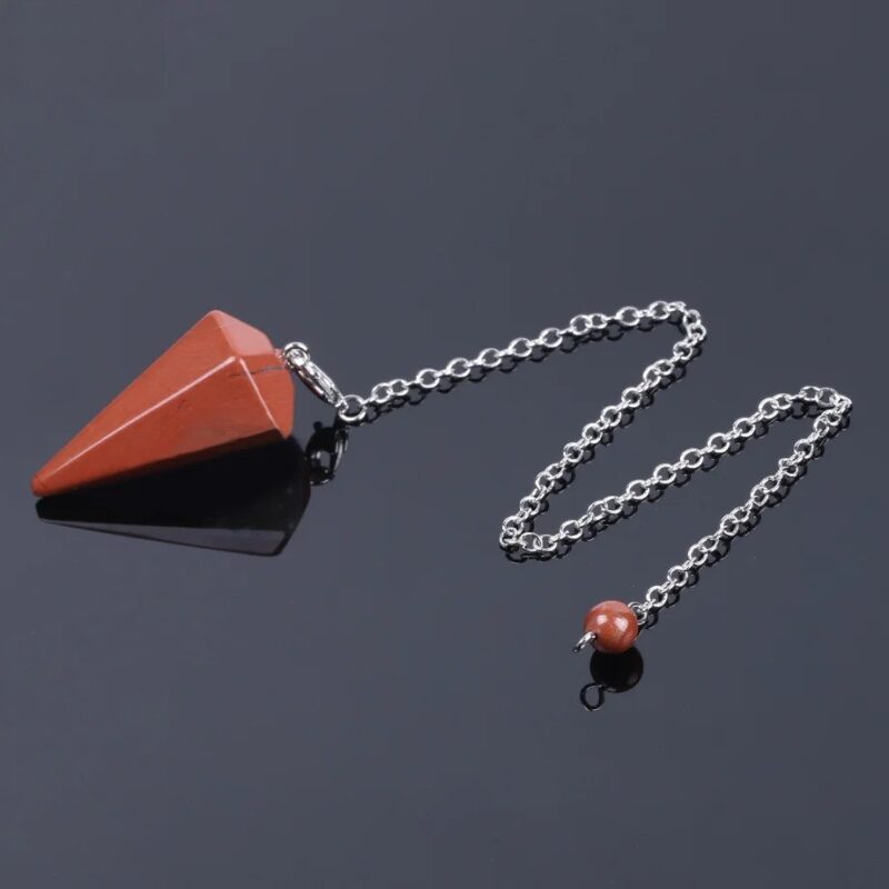 Red jasper pendulum with silver chain.