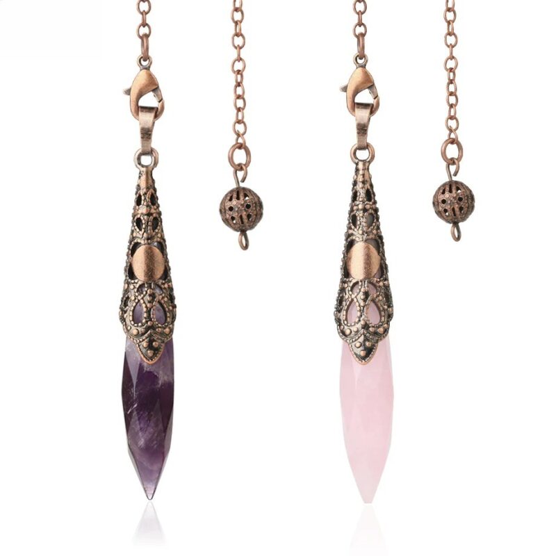 Two gemstone pendulums, amethyst and rose quartz, with ornate copper-toned metal casings.