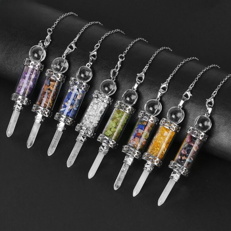 Crystal pendulums, various colors, small stones inside, clear glass tubes, silver metal accents.