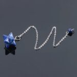Lapis lazuli star pendulum on chain.