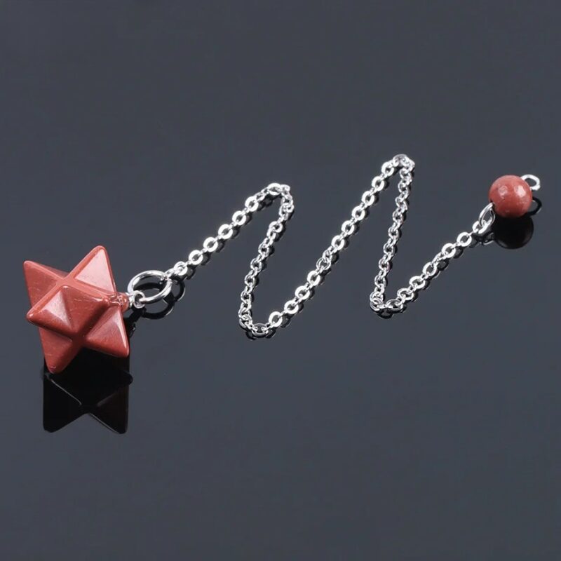 Red stone star pendulum with silver chain.