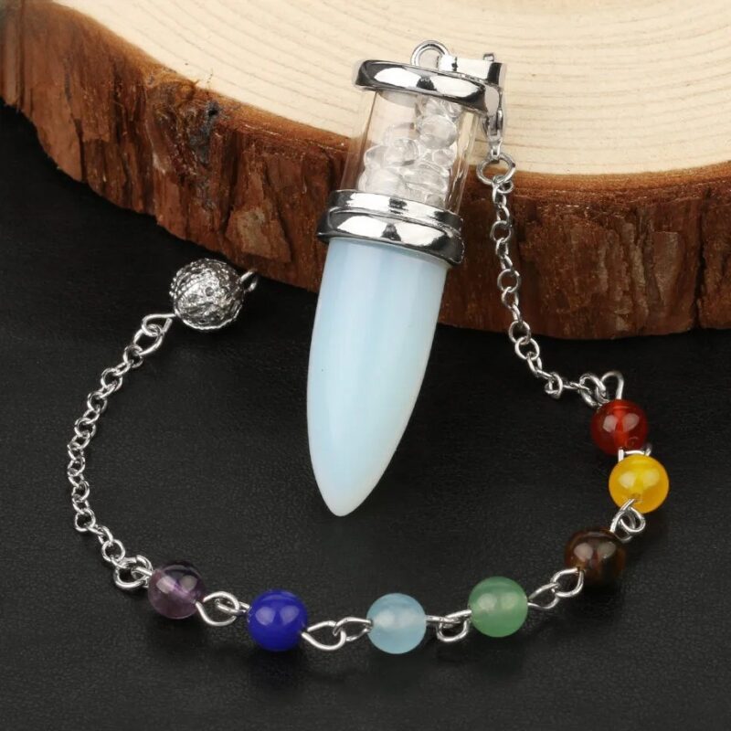 Opal pendulum with chakra beads.  Crystal point, silver chain, colorful stones.