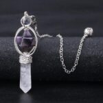 Amethyst and quartz crystal pendulum necklace.