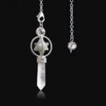 Crystal pendulum with star and clear quartz point.  Spiritual tool.