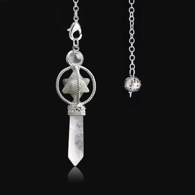 Crystal pendulum with star and clear quartz point.  Spiritual tool.