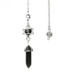 Black onyx pendulum with silver chain and star design.