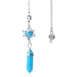 Turquoise crystal pendulum with star and metal chain.