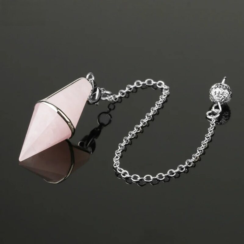 Pink rose quartz pendulum with silver chain.