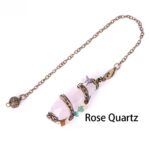 Rose quartz pendulum with brass chain and small gemstone accents.