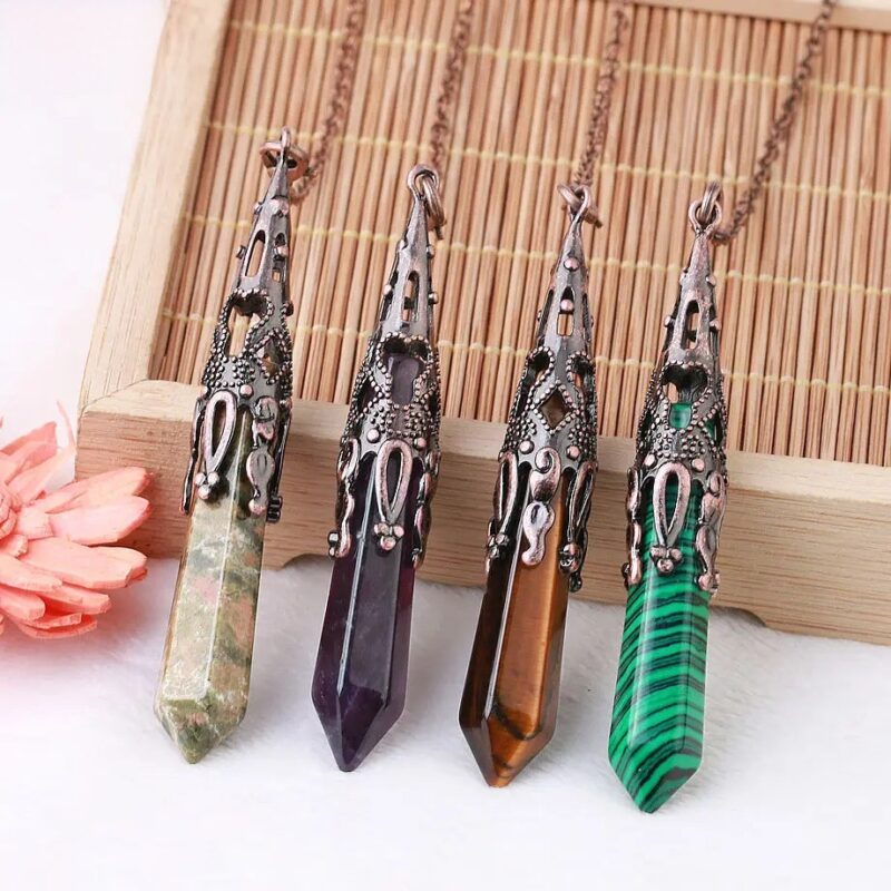 Four gemstone pendants,  bronze ornate settings,  amethyst, tiger's eye,  and malachite.