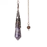 Amethyst pendulum with copper-toned metal accents.