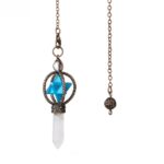 Copper-toned pendulum with turquoise stone and crystal point.