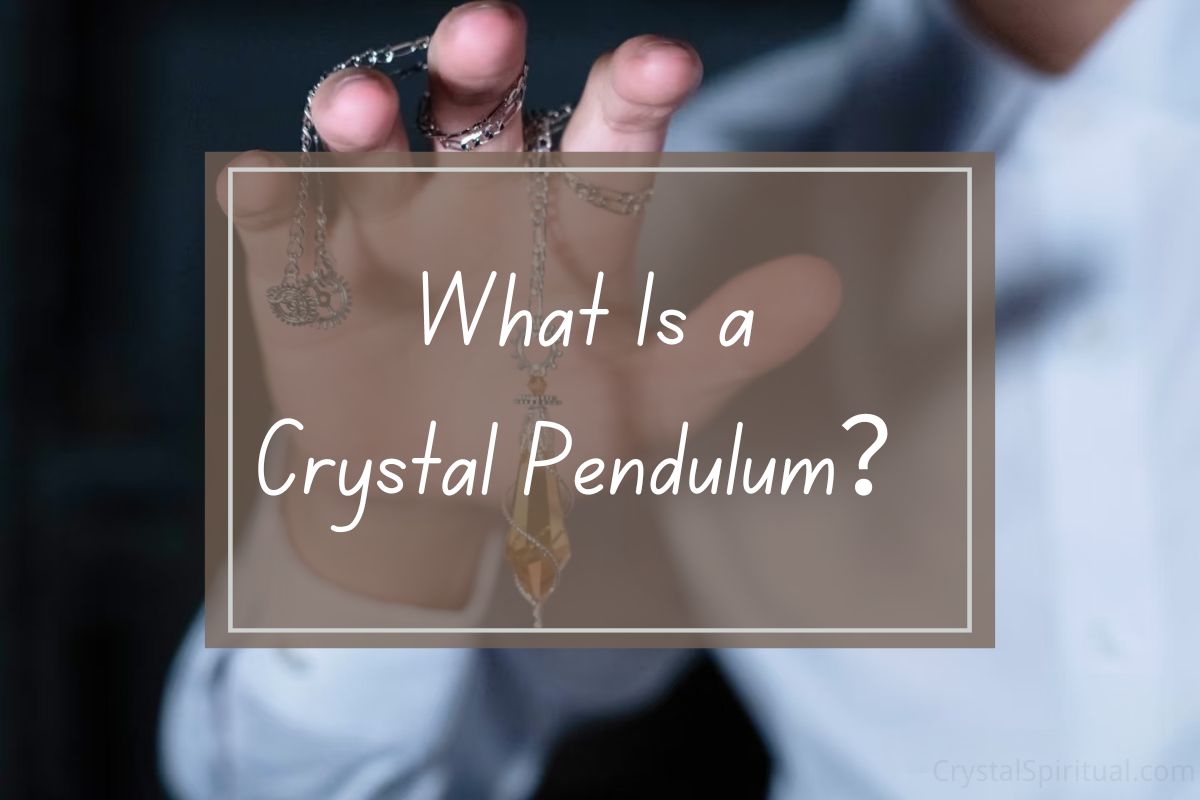 Hand holding crystal pendulum, question about crystal pendulum.