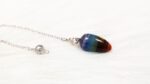 Rainbow chakra pendulum, silver chain.