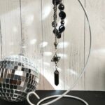 Black beaded necklace, pendant, and crystals.  Unique jewelry.