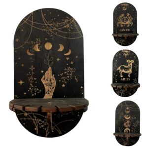 Black wooden wall art, zodiac signs,  and moon phases, decorative shelves.