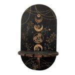 Dark black wooden wall shelf with moon and flower design.  Decorative, celestial.