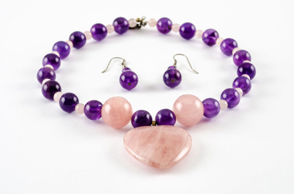 Purple amethyst and rose quartz beaded necklace and earrings set.