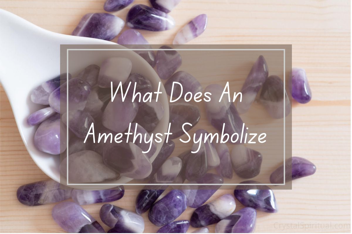 Many tumbled amethyst gemstones, some in a small white bowl,  with text overlay reading "What Does An Amethyst Symbolize".