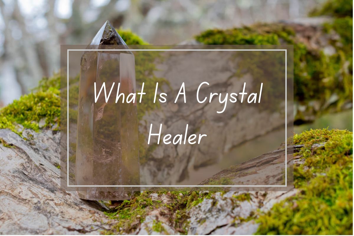 Smoky quartz crystal on a log, what is a crystal healer.