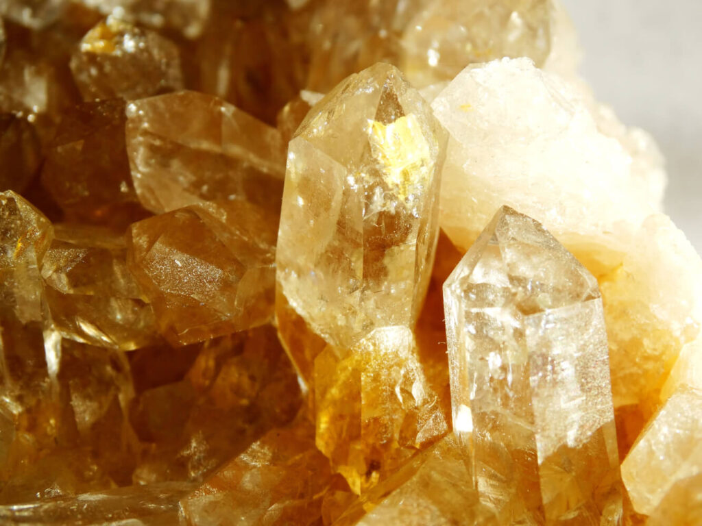 Close-up of cluster of golden quartz crystals.