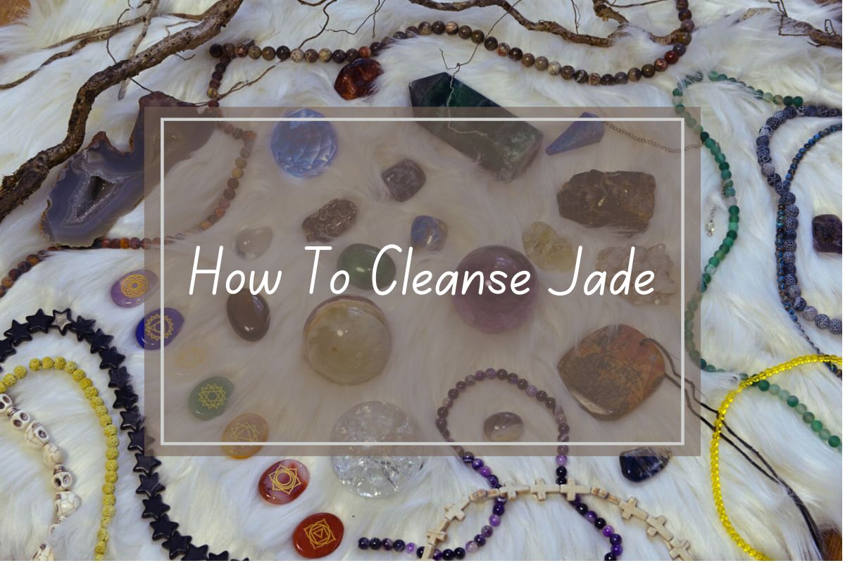 Various gemstones, crystals, and beaded jewelry displayed on a white fur surface.  Text overlay reads "How To Cleanse Jade."