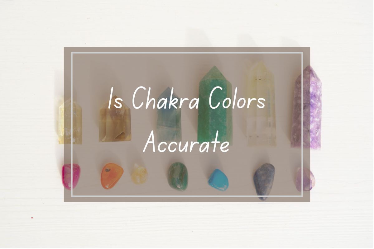 Colorful crystals and stones arranged in chakra color order, questioning chakra color accuracy.
