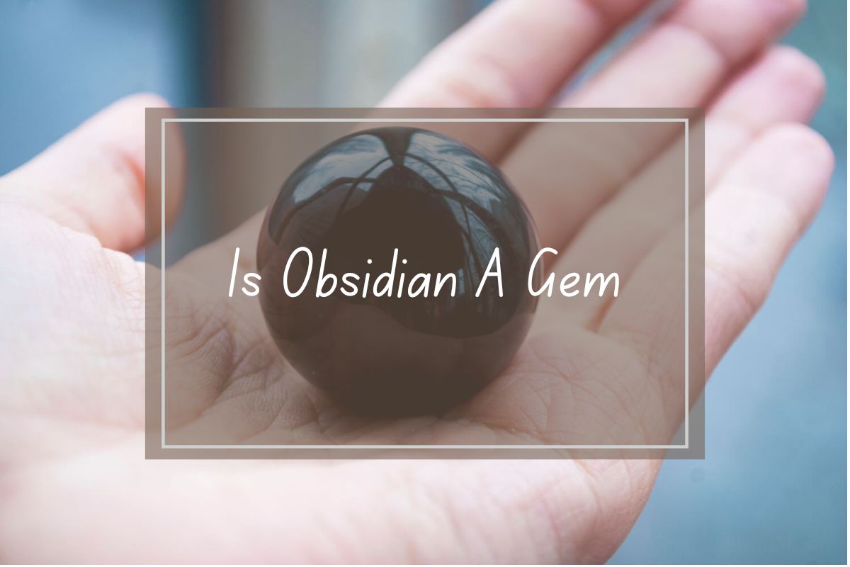 Dark obsidian sphere held in hand, question "Is Obsidian A Gem?".