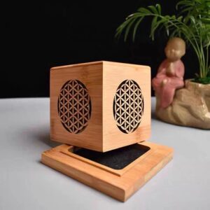 Wooden cube incense burner with flower of life design.
