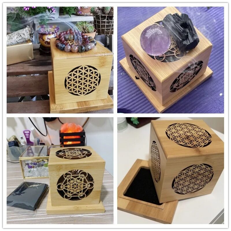 Wooden box with flower of life design, used for incense or crystals.  Spiritual/decorative item.