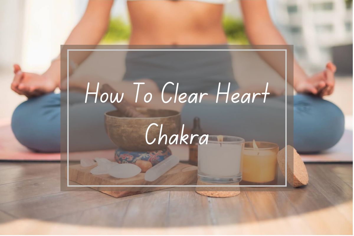 Person meditating, How To Clear Heart Chakra, yoga props.